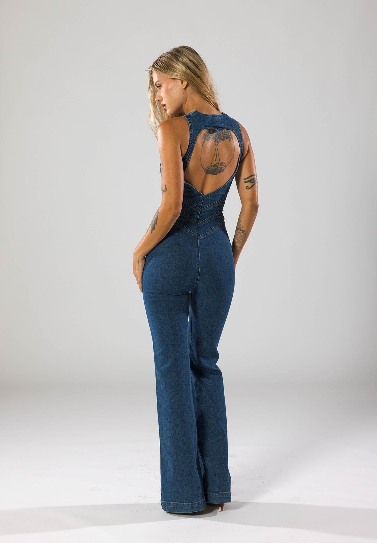 Heartthrob Backless Denim Jumpsuit – Flare-Leg One-Piece with Heart Cutout TARHUS