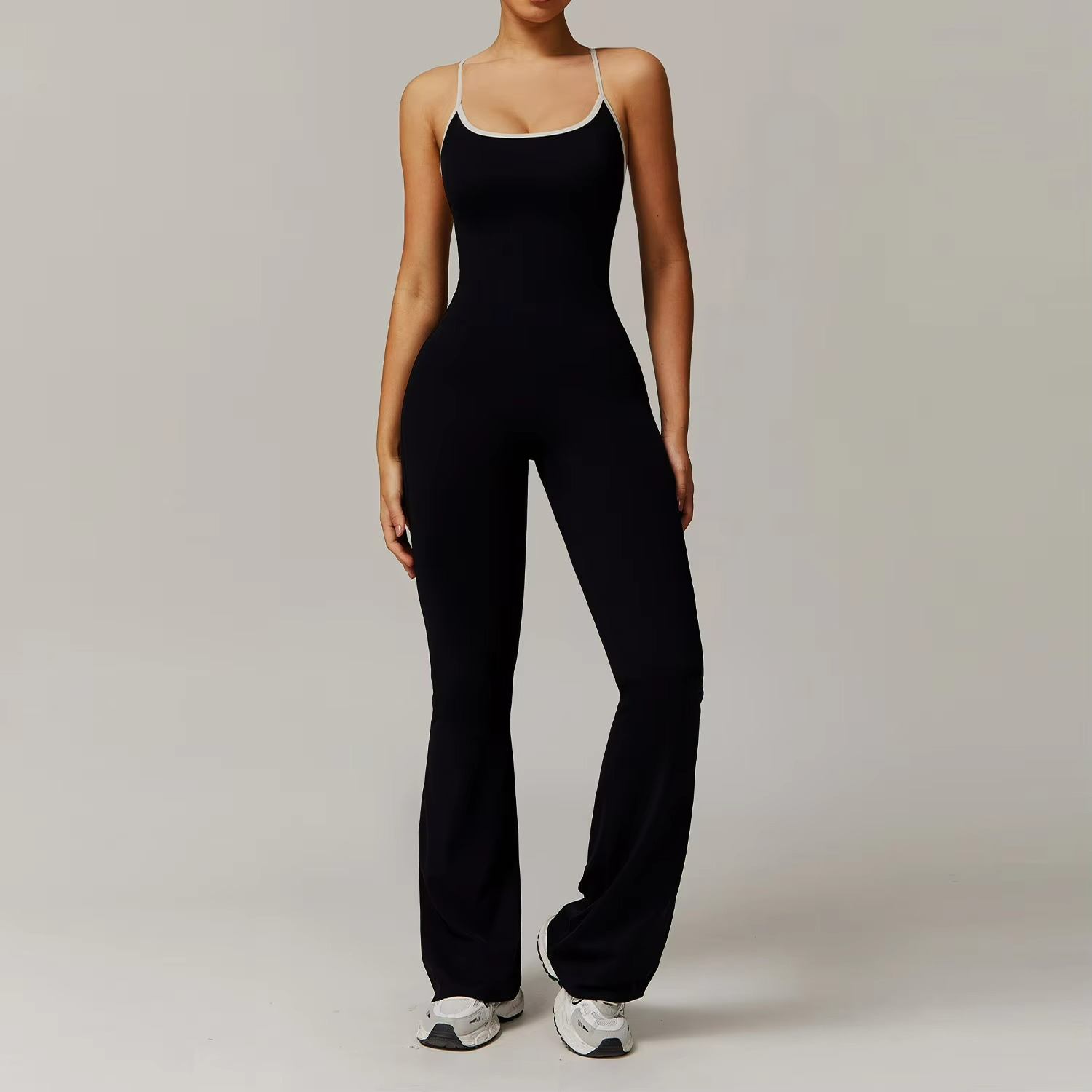 Virella | Flared Pilates Jumpsuit with Alluring V-Back TARHUS  Pilates Jumpsuit